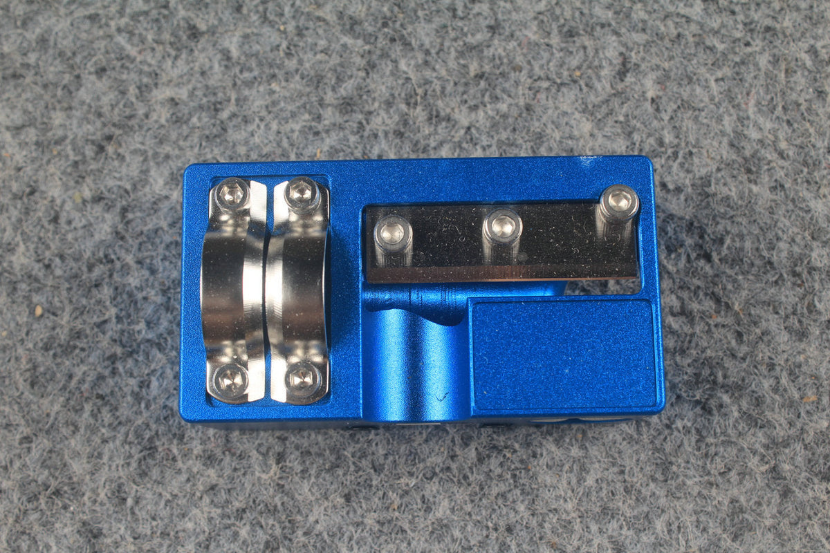 5 in 1 Cue Tip Tool – angled view showing diamond abrasive pad and stainless clamp