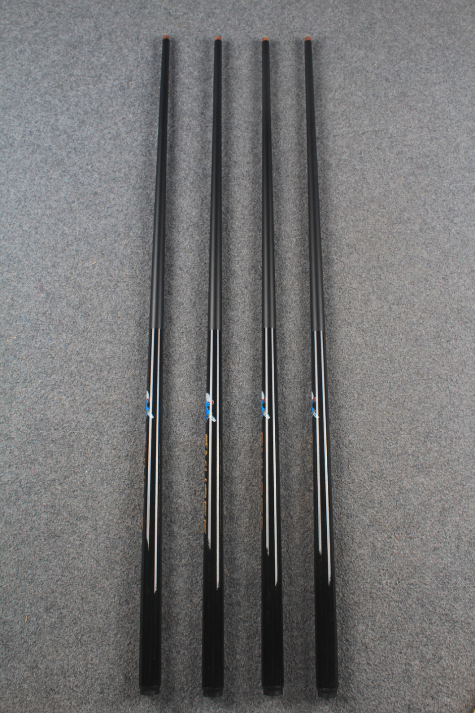 Four 42.5'' Junior Cues WOODS CUES